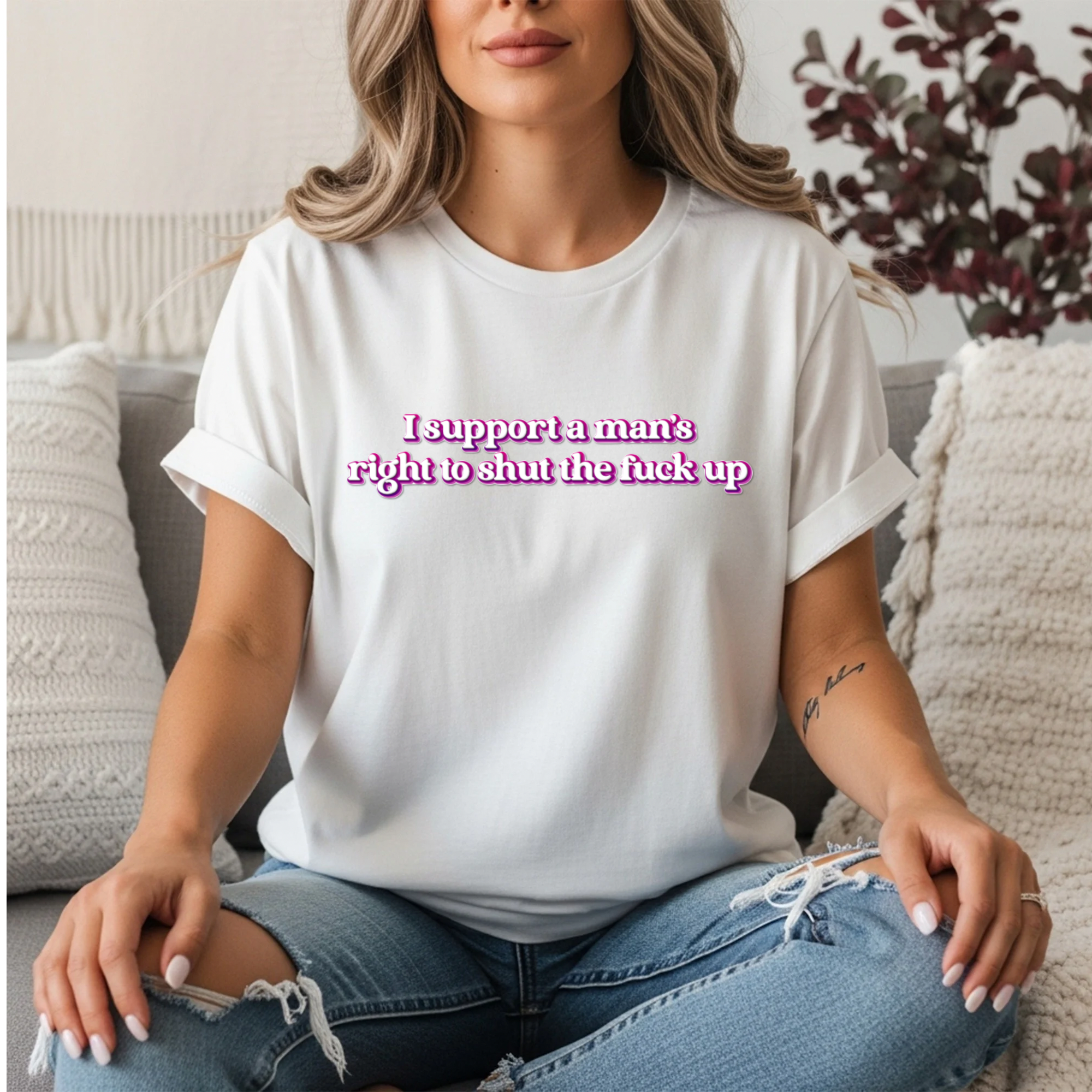 Women’s white feminist t shirt with pink and white bubble text  “I support a man’s right to shut the fuck up”
