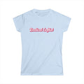 Women’s light blue  political t shirt with the words “radical leftist” in pink and white script