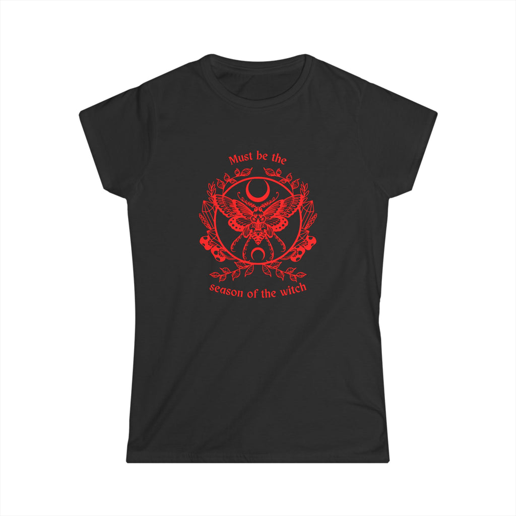 Women’s  black witchy t shirt with bold red text reading “must be the season of the witch” with a moth, circle of crystals and moon graphic. 